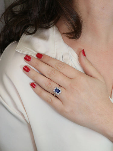 Bague Bague vintage pierre bleue entourage diamants 58 Facettes J525