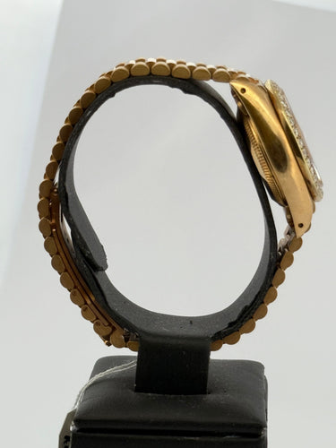 Montre femme Rolex Oyster perpetual or et diamants