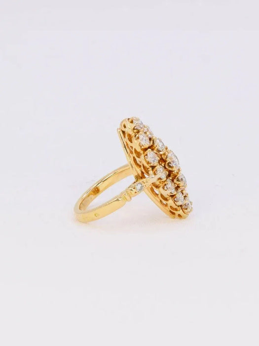 Vintage marquise ring in yellow gold with diamonds