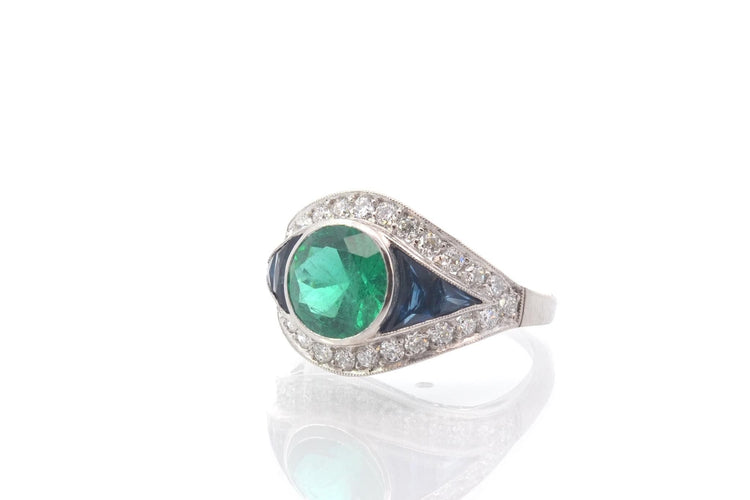 Bague 54 Bague art déco émeraude, saphirs et diamants en platine 58 Facettes 25727 25292