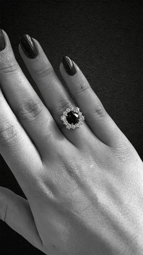 Bague Bague hexagonale sertie de diamants et ornée d'un saphir central 58 Facettes