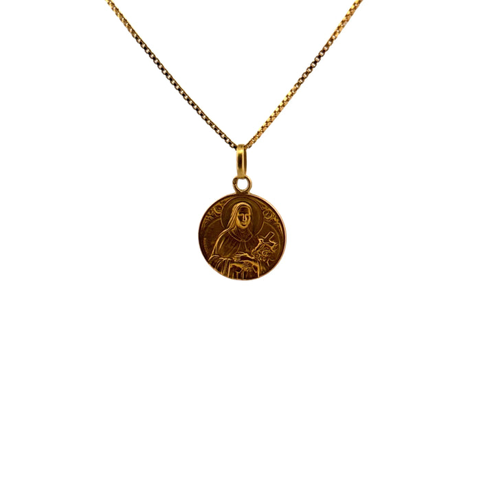 Medalla de oro amarillo de Santa Teresa