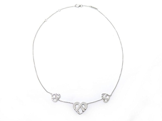Collier collier POIRAY coeur entrelace multi en or blanc 58 Facettes 259874