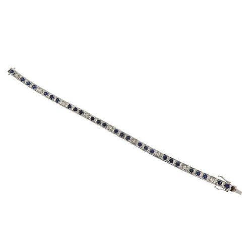 Bracelet Bracelet tennis en or blanc avec saphirs et diamants 58 Facettes G3816