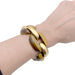 Bracelet Bracelet vintage, or jaune et oeil de tigre. 58 Facettes 33986