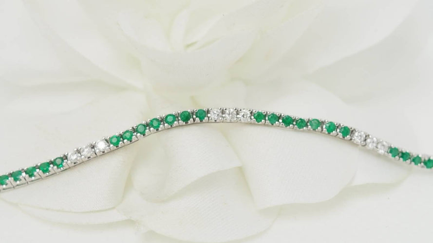 Bracelet Bracelet rivière en or blanc, émeraudes et diamants 58 Facettes 32238