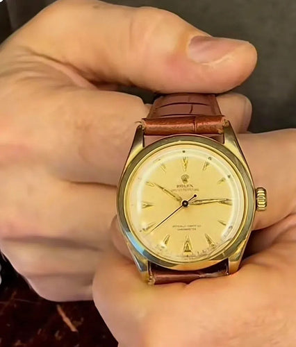 Montre Rolex Oyster Perpetual, Réf 6084, boîtier en or 14 carats 58 Facettes