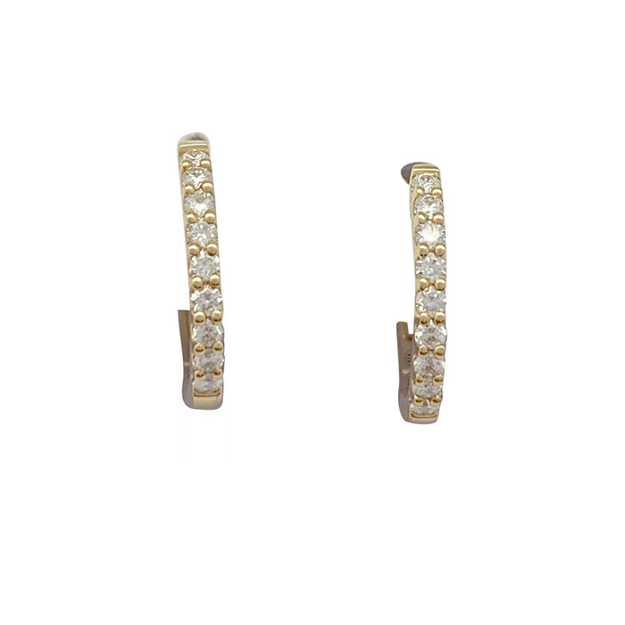 Pair of small yellow gold hoop earrings with diamonds.