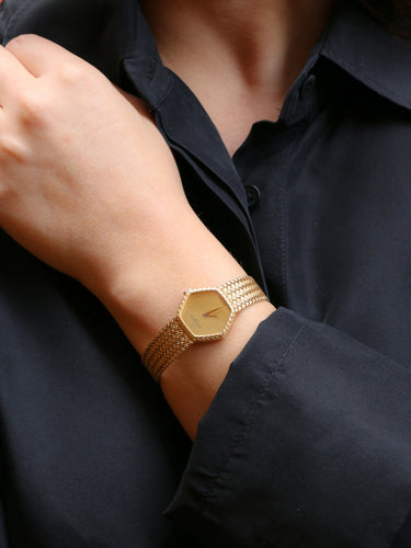 Montre BAUME & MERCIER - Montre vintage or jaune maille tressée 58 Facettes 1067.3