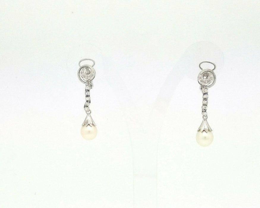 Boucles d'oreilles Boucles d'oreilles en or blanc avec perles et diamants 58 Facettes