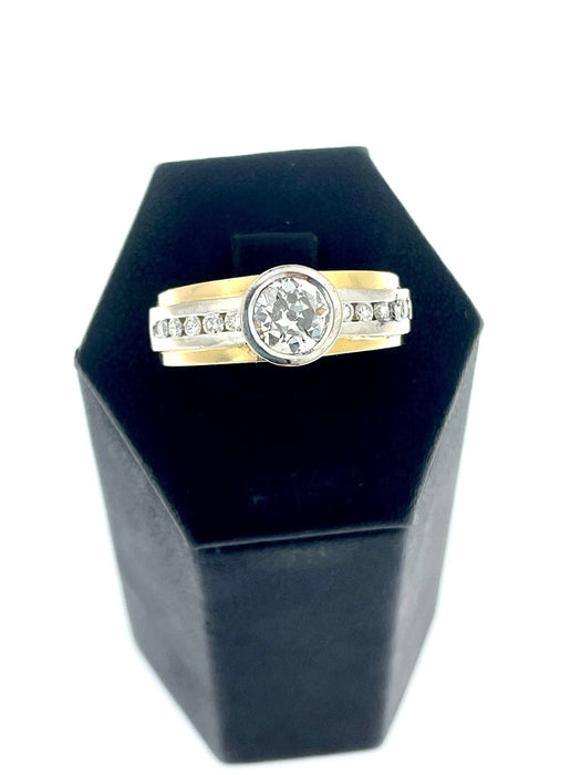 Bague Bague en or jaune et blanc avec diamant 58 Facettes