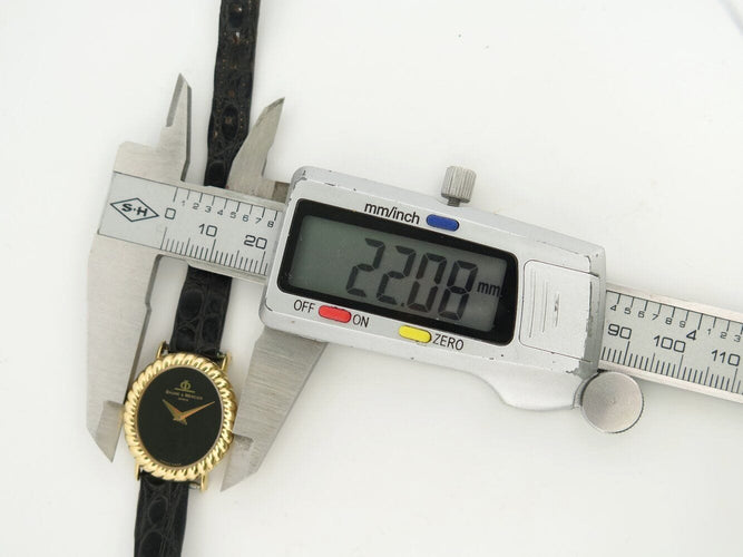 Montre vintage montre baume & mercier ovale 38336 en or jaune 18k mecanique lady 58 Facettes 271279