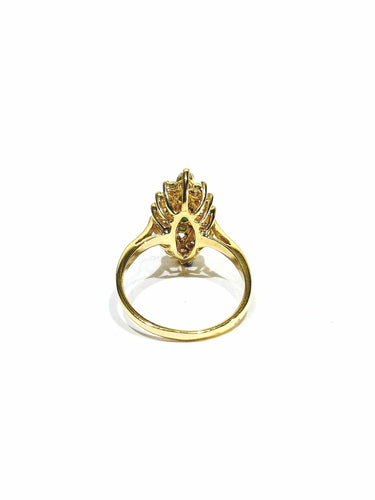 Bague 57 Bague marquise en or jaune, émeraudes et diamants 58 Facettes