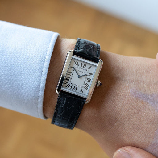 Montre Cartier - Montre Tank Solo quartz cadran ivoire chiffres romains boîtier acier 58 Facettes