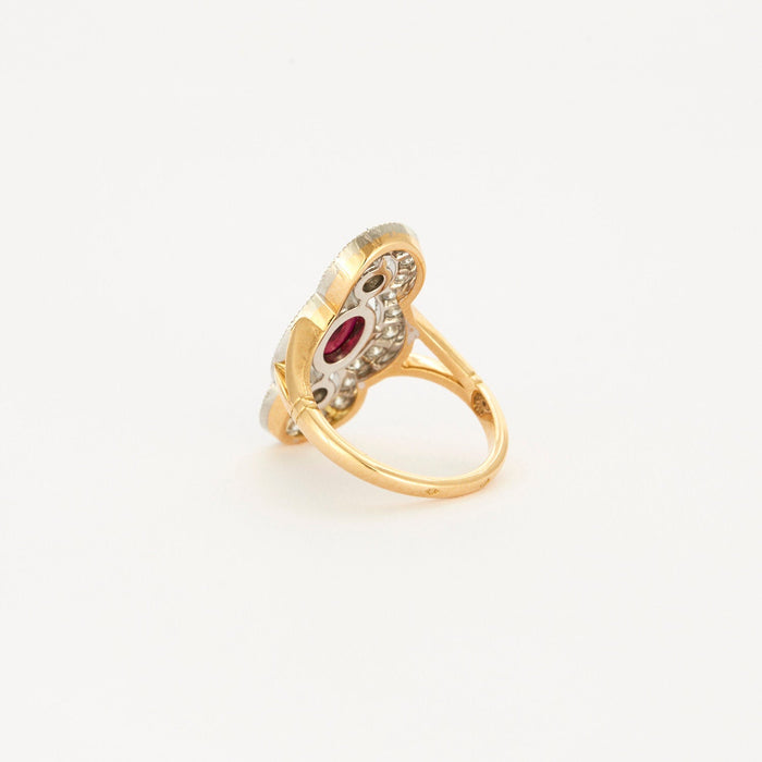 Art Deco Style ring in yellow gold, platinum, diamonds and ruby center