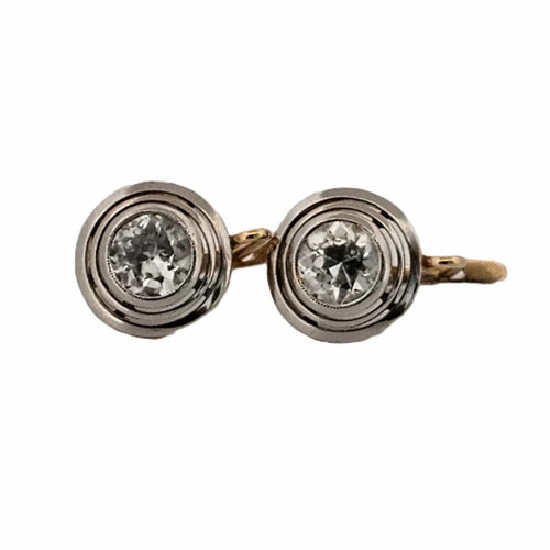 Ohrringe aus silber und niedrigem Gold mit großen Diamanten 