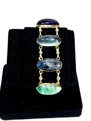 Bracelet Bracelet en or champagne 18 carats et pierres fines cabochon 58 Facettes