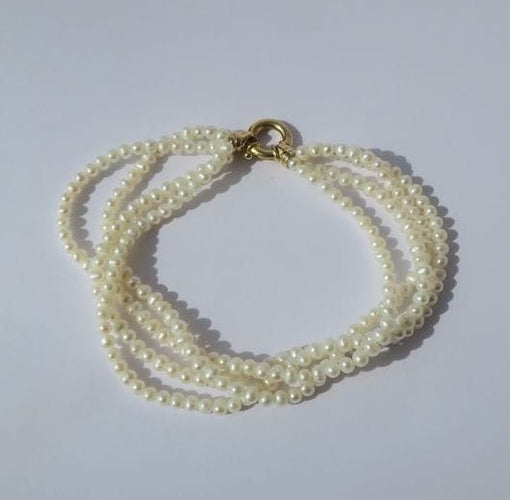 Bracelet Bracelet quatre rangs perles de culture 58 Facettes