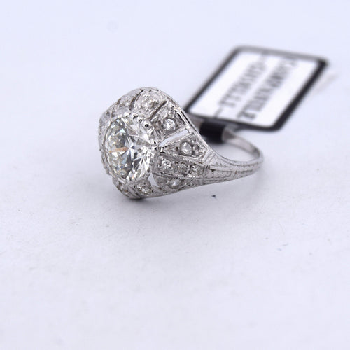 Bague 48 Bague ancienne en platine et diamants avec diamant central 58 Facettes