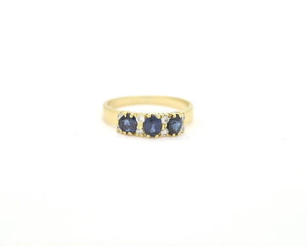 Bague Bague en or jaune sertie de saphirs et de diamants 58 Facettes 13396