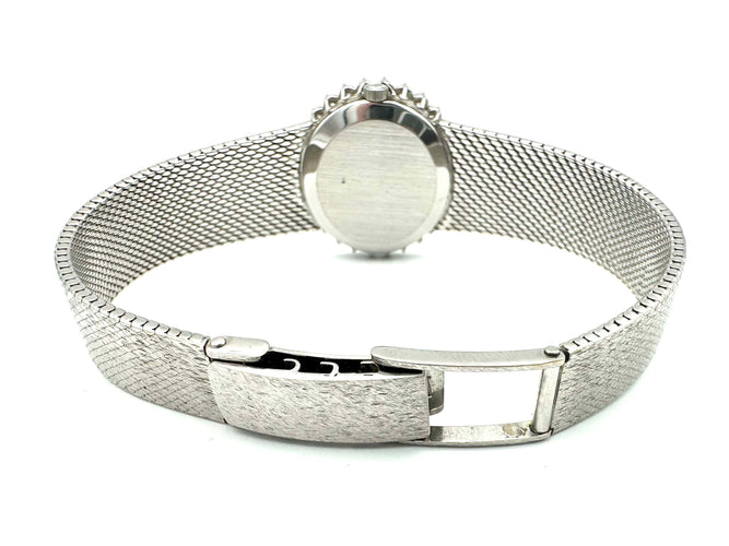 Montre OMEGA. Collection "De Ville", montre de dame vinatge or et diamants 58 Facettes