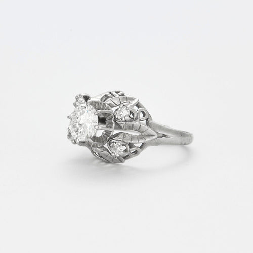 Bague 52 Bague dôme en platine, or blanc et diamants 58 Facettes