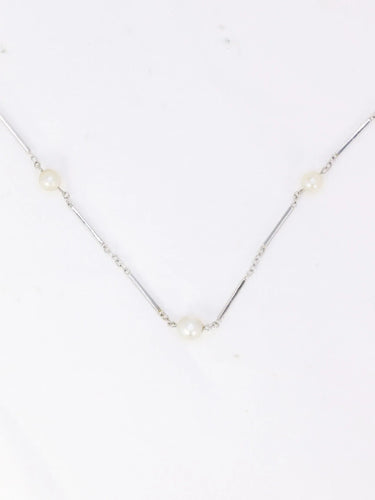 Collier Collier chaîne vintage or blanc perles 58 Facettes 941