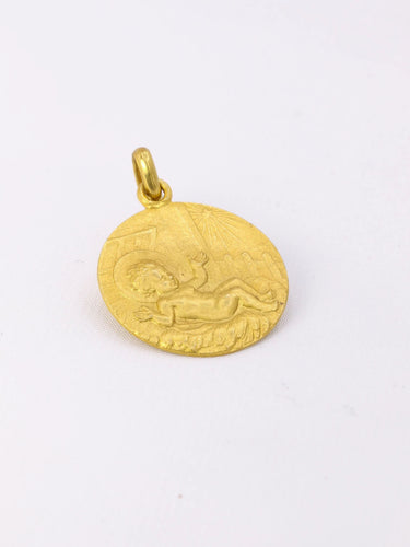 Pendentif Pendentif religieux vintage Jésus nouveau né or jaune 58 Facettes 1087.17