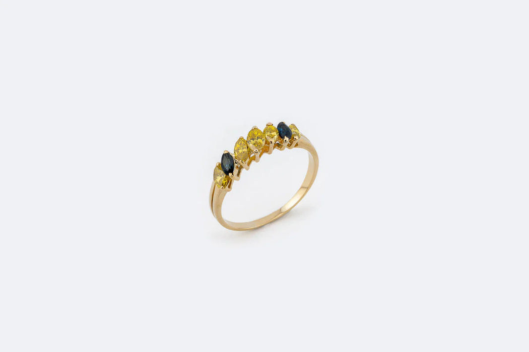 Fancy yellow gold river with sapphires