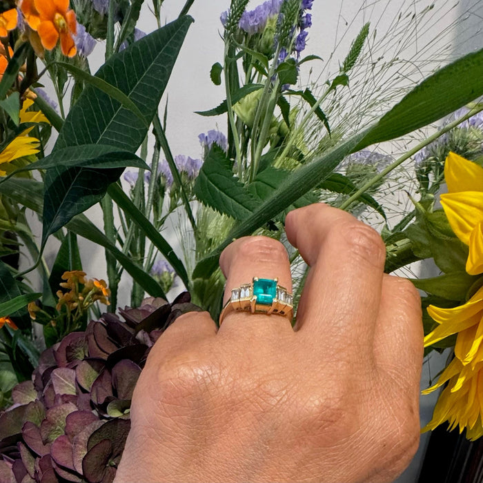 Yellow gold emerald diamond ring