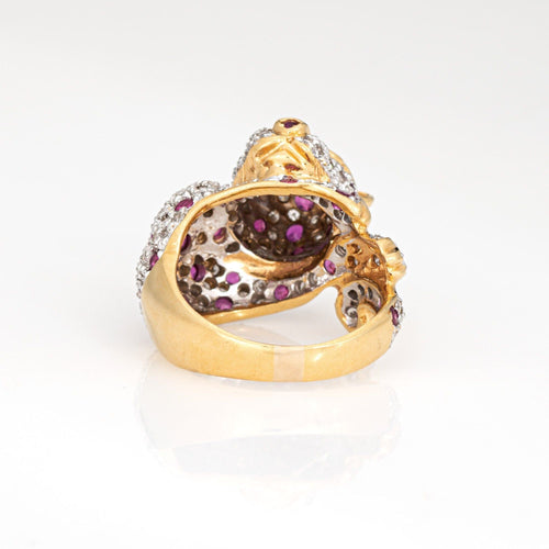 Bague Bague léopard vintage en or jaune 18 carats, taille 7, sertie de diamants, rubis et émeraudes aux yeux d'animaux. 58 Facettes G14000