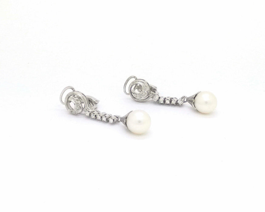 Boucles d'oreilles Boucles d'oreilles en or blanc avec perles et diamants 58 Facettes