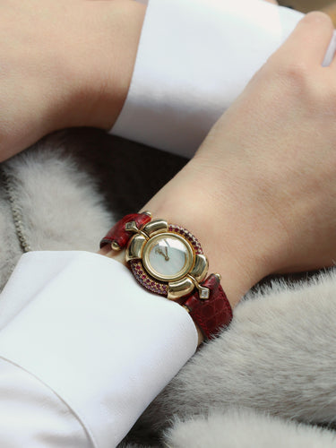 Montre RENE BOIVIN Montre Chrysalide or jaune rubis saphirs diamants 58 Facettes 1089.1