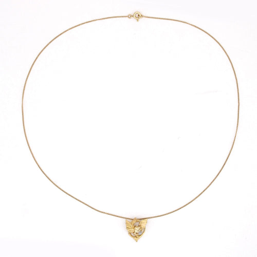 Ciondolo antico a forma di chimera con diamanti e relativa catena