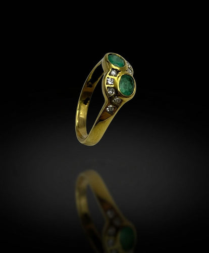 Bague Bague sinueuse ornée d'émeraudes et de diamants 58 Facettes