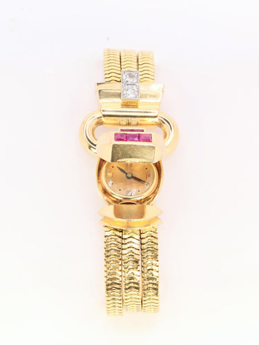 Montre UTI - Montre à secret tubogas or jaune diamants rubis calibrés 58 Facettes 1153.5