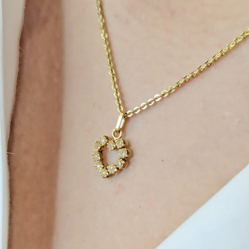 Pendentif Pendentif coeur en or jaune et diamants 58 Facettes 33147