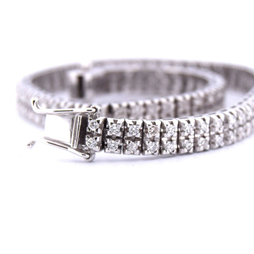 Bracelet BRACELET « TENNIS » EN OR BLANC 18 KT AVEC DIAMANTS 58 Facettes