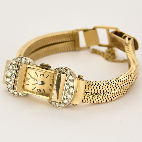 Montre Montre dame années 40 or jaune et diamants 58 Facettes