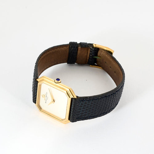 Montre Baume & Mercier - Montre Modèle Vintage en or jaune et cadran gris clair. 58 Facettes