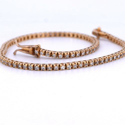 Bransoletka tenisowa z żółtego złota 18 kt i diamentów 58 Facettes BR116