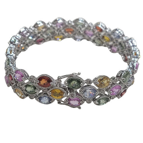 Bracelet Bracelet en or blanc 18 carats serti de saphirs multicolores et de diamants brillants 58 Facettes P175