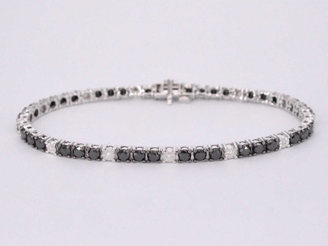 Bracelet Bracelet de tennis en or blanc serti de diamants noirs et blancs 58 Facettes 2119