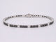 Bracelet Bracelet de tennis en or blanc serti de diamants noirs et blancs 58 Facettes 2119