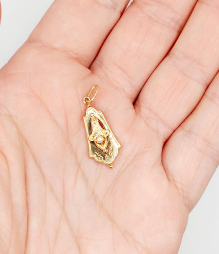 Pendentif Pendentif or rose, or jaune orné d'une perle (circa 1900) 58 Facettes A06292
