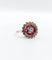 Bague 48 Bague cible Art Déco or rose, diamant, rubis calibrés (circa 1920) 58 Facettes A04432