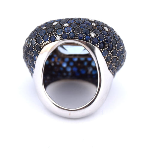 Bague 54 Bague en or blanc avec topaze, saphirs et diamants - Années 1950 58 Facettes