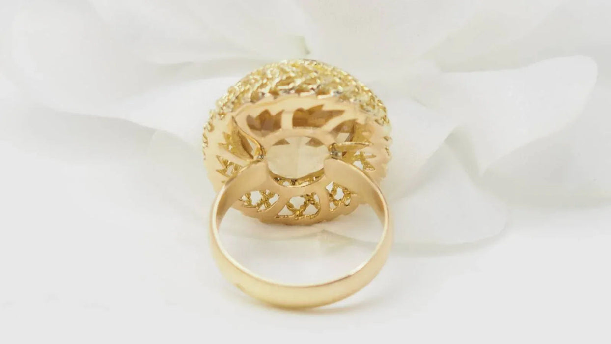 Filigree ring in yellow gold and faceted citrine