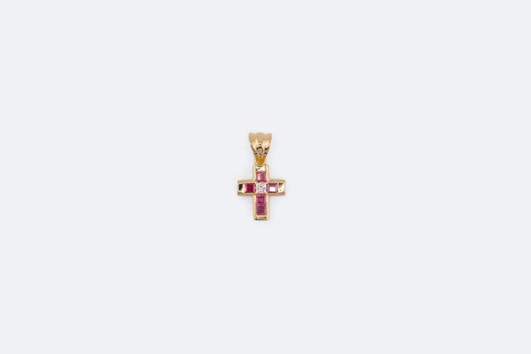 Crucifix pendant in yellow gold with rubies and diamonds