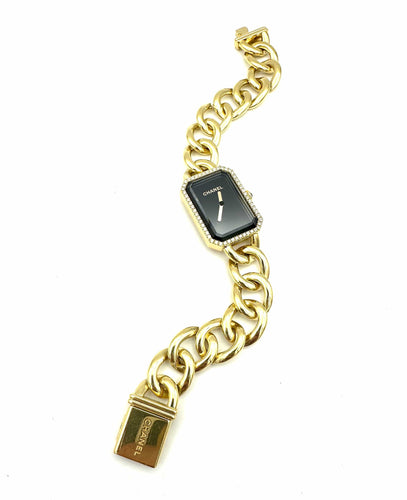 Montre CHANEL. Collection "Première chaine gourmette", montre en or jaune 18K 58 Facettes